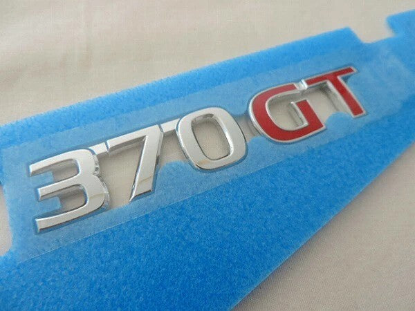 Genuine OEM Nissan G37 370GT Emblem Badge 84896-JL00A